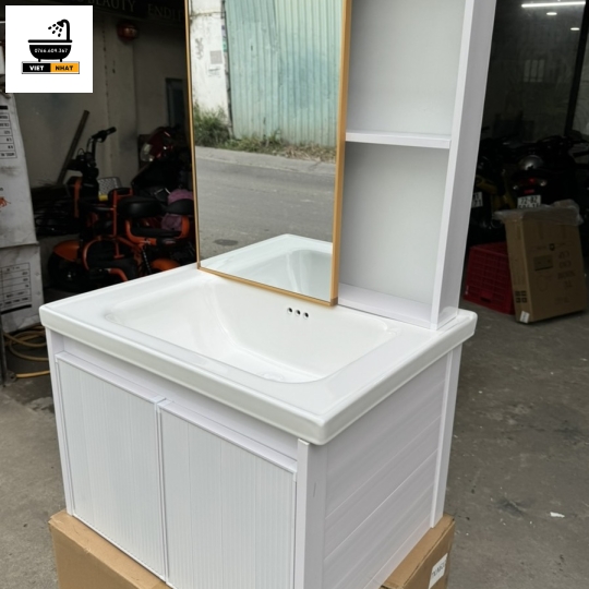 TỦ LAVABO MÀU TRẮNG - VIỀN VÀNG - 60X47 - NHỰA NHÔM