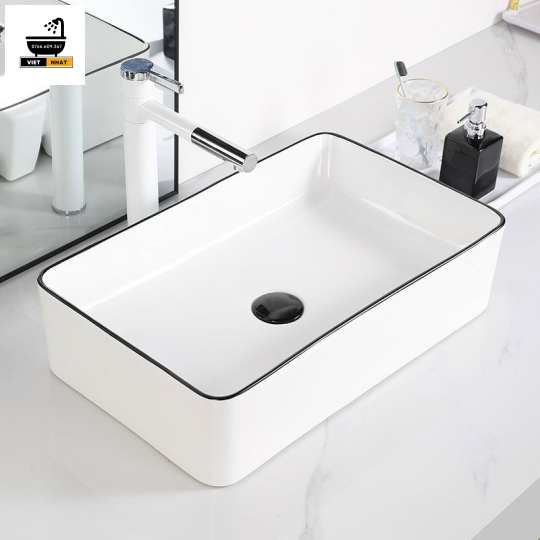 LAVABO SỨ DÀI VIỀN ĐEN 